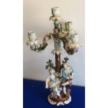 A late-19th/early-20th century Dresden-style four-light porcelain Candelabra,