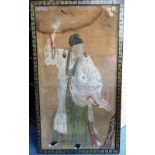 A large and rare framed 18th century Chinese painting on silk of a man in festive spirits holding