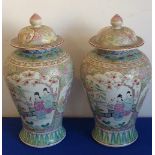 A pair of late-19th / early-20th century Chinese baluster-shaped porcelain Vases and Covers