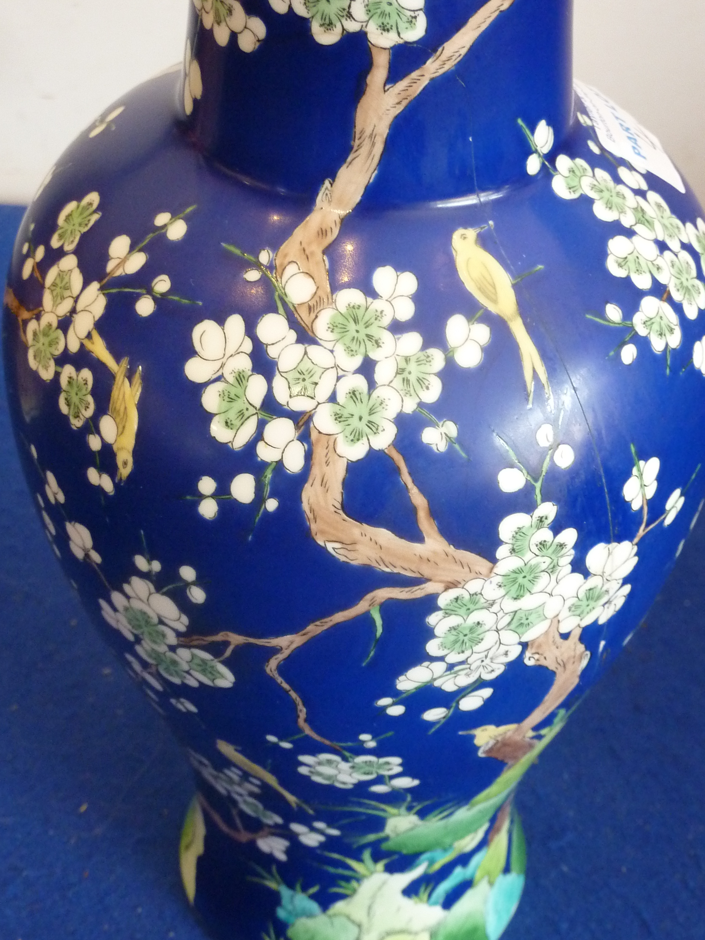 A 19th century Chinese porcelain Vase hand-decorated in underglaze blue and white with flowers and - Image 5 of 7