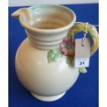 A circa 1940s Clarice Cliff pottery jug in good condition;