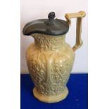 A 19th century pewter-mounted salt-glazed Jug with impressed harvest ornament to include hops,