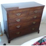 An 18th Century mahogany chest; thumbnail moulded top above a frieze,