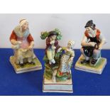 Three 19th century Staffordshire flat back figures: the cobbler and his wife,