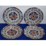 A set of four late-18th century Chinese export porcelain plates hand-gilded and decorated typically