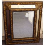A good Venetian-style and gilt-metal mounted wallhanging looking glass;