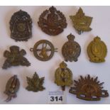 Eleven foreign and Commonwealth cap badges: Canada Overseas 211;