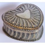 A 19th century hallmarked silver heart-shaped trinket box and cover; gilded interior,