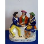 A 19th century Staffordshire figure group, Auld Lang Syne,