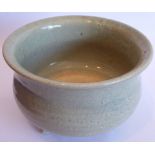A Chinese Southern Song period celadon glaze ceramic tripod censer;