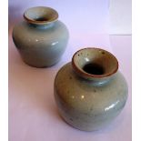 A pair of Chinese ceramic celadon glaze jars; late Ming period,