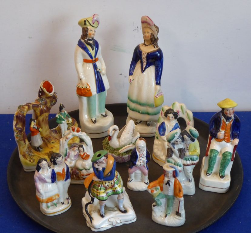 An assortment of twelve 19th century Staffordshire figures (12)