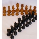 An early 20th century boxwood and ebonised chess set in Staunton style CONDITION REPORT: