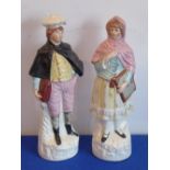 A pair of 19th century Staffordshire flat back figures;