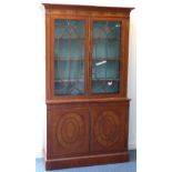 A good 19th century satinwood bookcase;