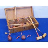 An early 20th century table croquet set