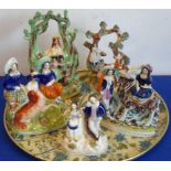 Five various 19th century Staffordshire groups to include a bocage-style model with two figures