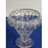 A large and heavy cut glass vase of inverted conical form,