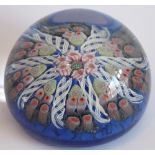 A circular paperweight with millefiori and other barley-twist style canes etc., 7.