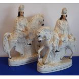 A large pair of 19th century Staffordshire flat back figures; riders on horseback carrying venison,