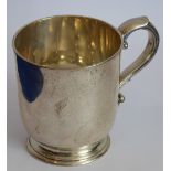 A heavy hallmarked silver Christening-style tankard; the underside marked for Garrard's,