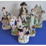 A group of six 19th century Staffordshire flat back figures to include Band of Hope and a Lord