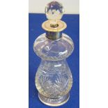 An early 20th century waisted baluster cut-glass decanter and stopper;