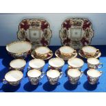 A mid 19th century porcelain part tea/coffee service: eight tea cups, three saucers,