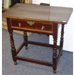 An early-18th century oak side table;