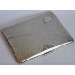 A heavy Art Deco period hallmarked silver cigarette case;