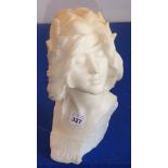 A carved white Carrara marble bust;