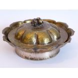 A 19th century Chinese silvered brass dish and cover; modelled as a lotus flower head,