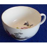 A 19th century Meissen porcelain cup; the interior hand-decorated with a floral spray,