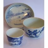 A Chinese porcelain group (Ming and Qing Dynasties) to include: a small saucer decorated with boats