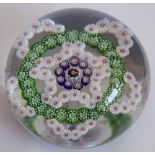 A fine Baccarat millefiori patterned paperweight, 7.8cm diameter x 5.