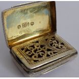 A Victorian hallmarked silver vinaigrette; gilt interior,