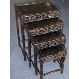 A set of four 19th century Chinese carved hardwood occasional tables;