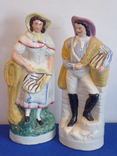 A pair of large 19th century Staffordshire flat backs, The Fish Sellers,