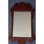 A George III period 18th Century mahogany framed wall hanging looking glass,