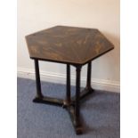 An early 20th century triangular occasional table having three foldover leaves,