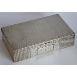 A rectangular hallmarked silver cigarette case;