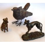 A bronze model of a sitting terrier-type dog together with a bronze model of a greyhound and a