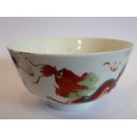 A 19th century circular Chinese porcelain tea bowl;