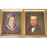 A pair of late 19th Century gilt framed oil on canvas shoulder length male and female portrait