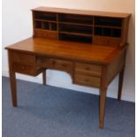 A late 19th Century French cherrywood bureau plat;