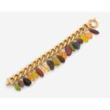 BRACELET PIERRES FINESIl porte dix-huit gouttes de pierres fines multicolores telles que citrines,