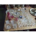 Four glass decanters together with cut glass bowl and cake stand together with drinking glasses