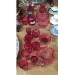 A Cranberry glass sugar sifter together with Cranberry glass vases, bowls, glasses etc.