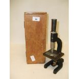 A cased microscope.