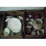 Two boxes of assorted ceramics including; jugs; plates etc.